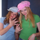 Image for article titled Trucker Hats, Pleather Pants, And MySpace Tees: Our Readers Model The Worst Fashion Trends Of The Decade